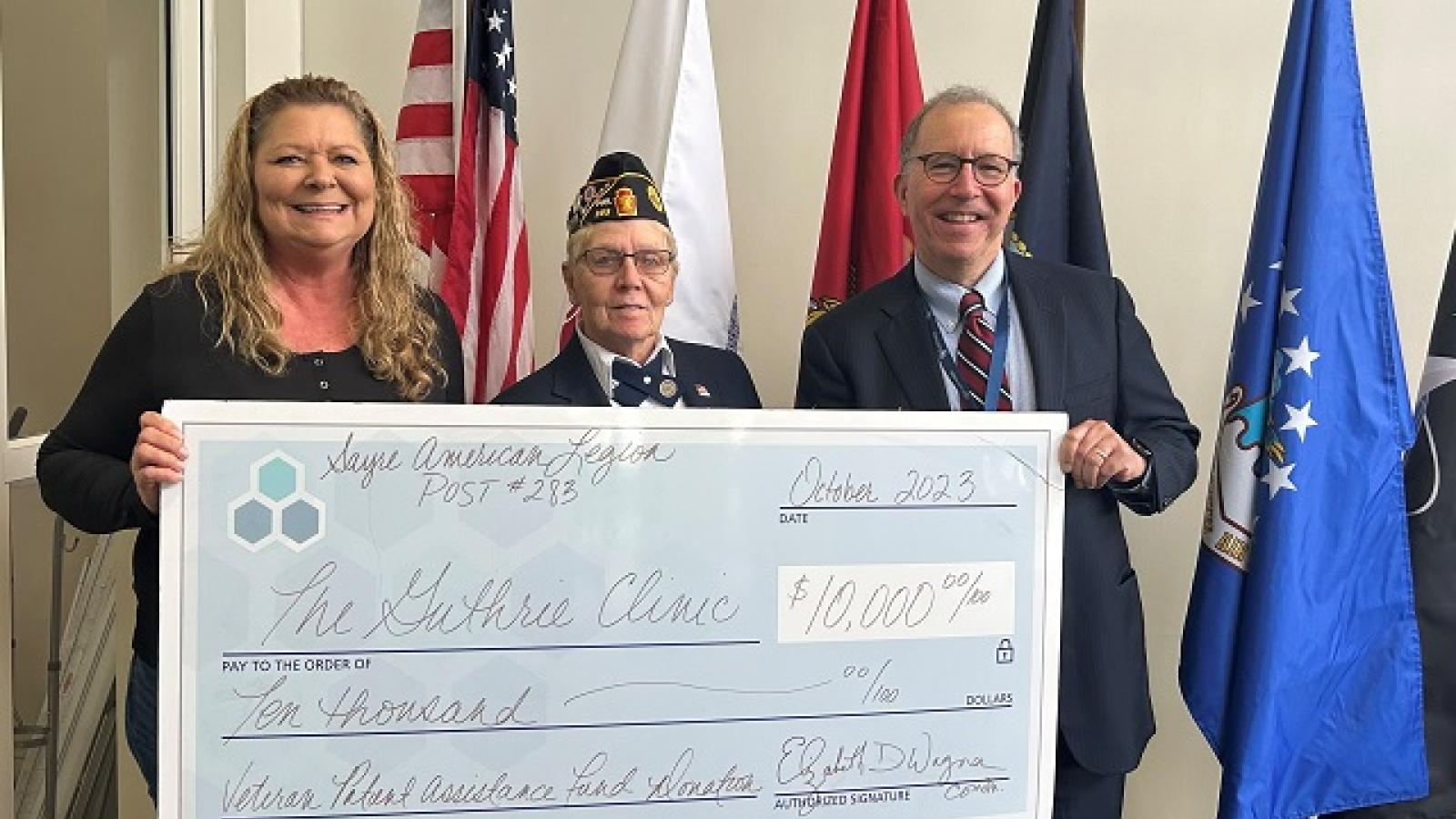 Connie Roberts, President, Sayre American Legion Auxiliary; Elizabeth Wagner, Commander, Sayre American Legion Post 283 and Dr. Edmund Sabanegh, Guthrie President and CEO.