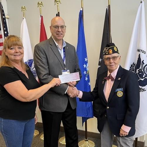 Pictured left to right: Connie Roberts, Tournament Manager; Jeffrey Grenzer, Senior Director, Talent Management and Experience, Guthrie; Elizabeth Wagner, Commander, Post 0283.